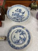 A 19th century blue and white plate, 31cm diameter and a large Japanese Imari dish, 41cm diameter