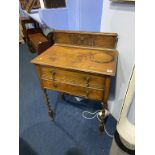 An oak barley twist side table