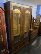 An Edwardian wardrobe and a dressing chest