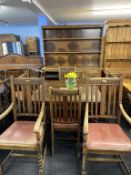 An oak eight piece barley twist dining room suite, table, dresser 4 chairs and 2 carver chairs