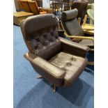 A brown swivel office chair
