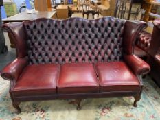 A three seater Chesterfield settee
