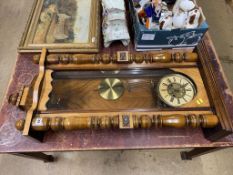 A walnut cased wall clock