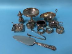 Silver, to include a sauce boat, cruet, and napkin rings etc.