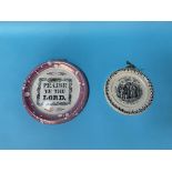 A Sunderland purple lustre circular wall plaque, 'Praise Ye Lord' and a small plaque 'History of