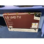 A boxed LG 5 OUP 75 TV