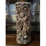 An Indonesian carved wooden panel, 77cm x 30cm