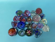 A collection of Caithness paperweights etc.