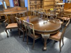 An Edwardian mahogany ten piece dining room suite, sideboard, table and 6 chairs and 2 carver