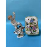 A Herend porcelain figure of a young boy, a box and a figure riding a swan