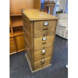 A 1930's oak four drawer Clarks filing cabinet