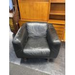 A black leather Habitat armchair