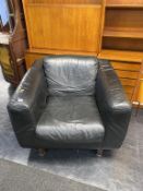 A black leather Habitat armchair