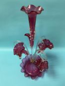 A Victorian cranberry and clear glass three basket epergne, 60cm height
