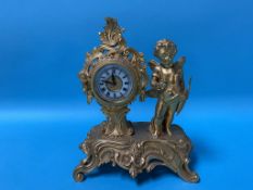 A small gilt metal clock by the Ansonia clock company, 21cm height