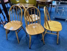 A set of four stick back chairs