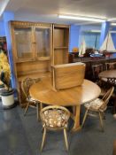 An Ercol dining room suite and small drop leaf table