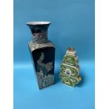 A Chinese vase on black ground and another Chinese lidded vase, 36cm and 24cm height
