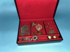 A jewellery box and contents, to include silver chains etc.
