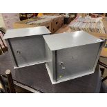 Two lockable steel cabinets