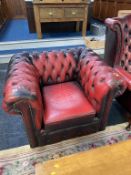 An oxblood Chesterfield Club chair