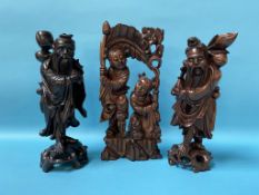 Three carved Japanese rootman figures