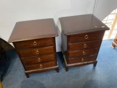 A pair of Stag bedside chests