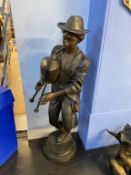 A modern bronze of a Gentleman playing the pipes, 120cm height