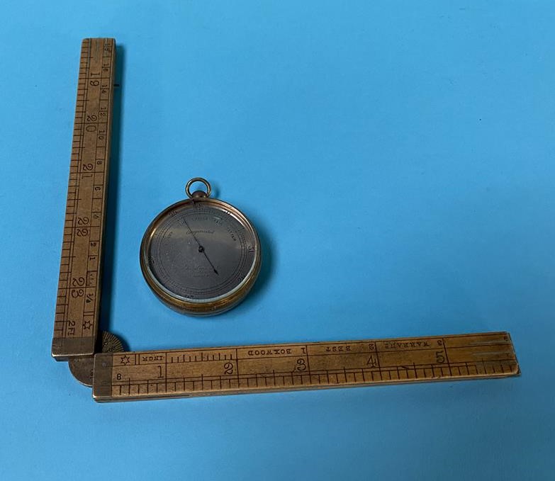 A boxwood rule and a pocket Gardner and Co. barometer