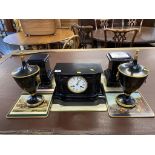 A Victorian slate mantle clock and a pair of Italian tole ware urns and covers, 30cm high