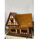 A dolls house and accessories