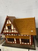 A dolls house and accessories