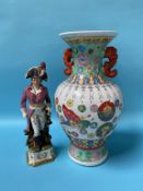 An Oriental vase and a continental figure
