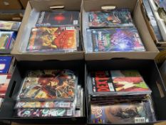 Four boxes of comics, to include DC and Marvel etc.