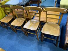 A set of four elm seat chapel chairs
