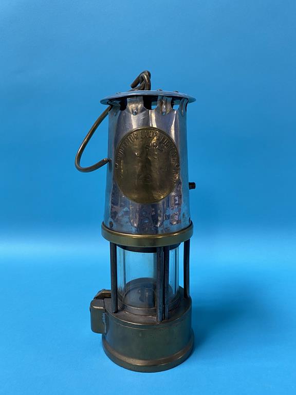 A miners lamp, stamped 'Epp Col'