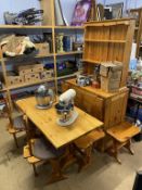 A pine kitchen table and dresser