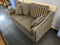 A two seater sofa bed