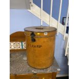 A tin flour bin