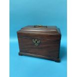 A mahogany tea caddy