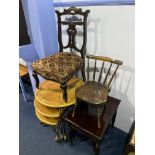 A nest of tables, wicker chair and storage box
