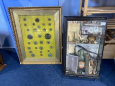 A framed collection of trinkets and framed coinage