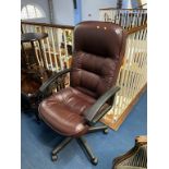 A revolving leather office chair