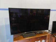 A Samsung curved 47" TV