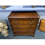 A mahogany straight front chest of drawers with brushing slide