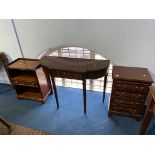 A modern mahogany half moon table, bookcase and small chest of drawers