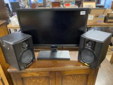 A pair of speakers and a monitor
