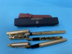 Two Watermans fountain pens and a Parker pen