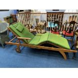 A teak sun lounger