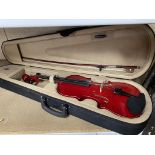 A modern violin and carry case